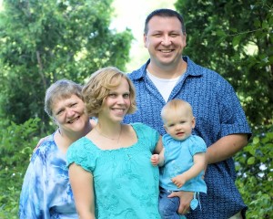 Sally George, far left, with her daughter, son-in-law, and granddaughter.