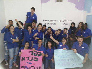 A meeting between Arab kids I work with in the town of Kfar Manda, and Jewish kids from Afula. They made a wall painting together in Hebrew and Arabic of a quote by poet Saul Tchernichovsky: “Because I still believe in humanity and its brave spirit.”